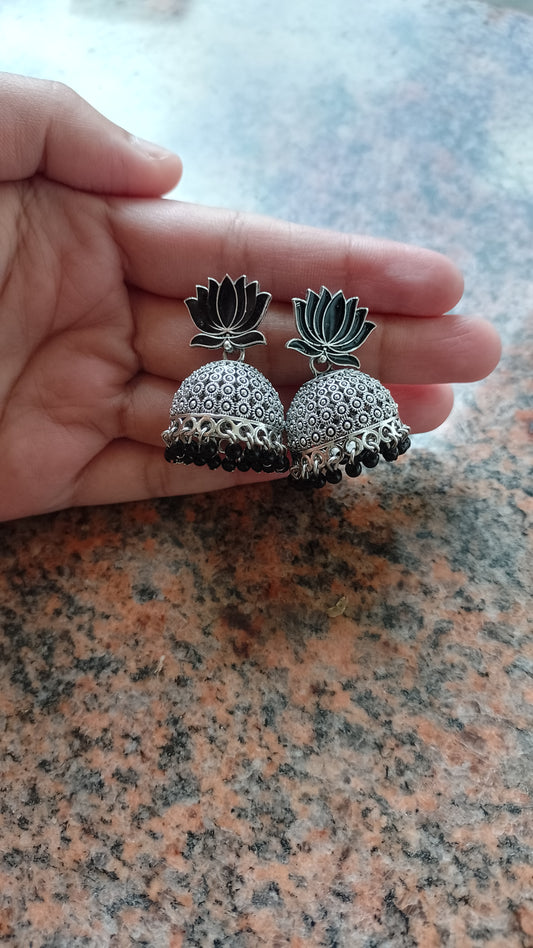 Lotus Design Oxidized Silver Jhumka Earrings
