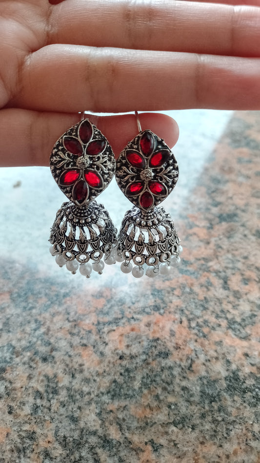 Antique Silver-Tone Red Stone Jhumka Earrings with Pearl Drops